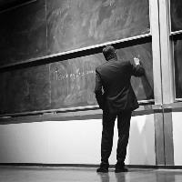 Don Lubach Don Lubach facing a chalkboard in a UCSB lecture hall.