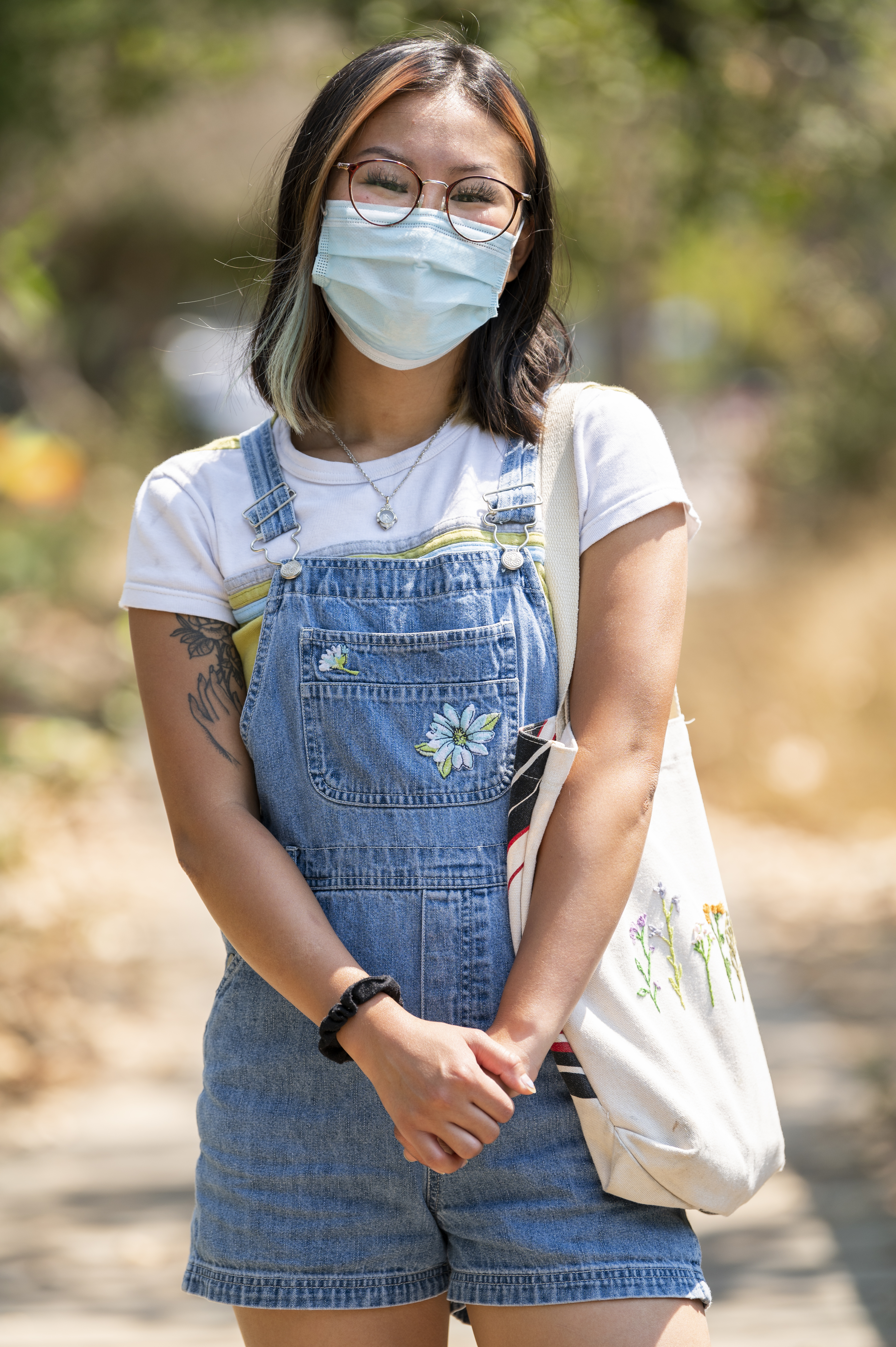 Image of a UCSB student learning a face covering