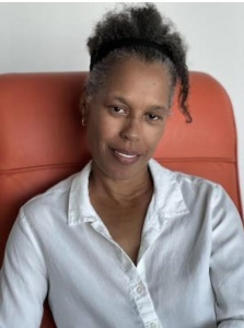 Photo of Professor Ingrid Banks sitting in a chair